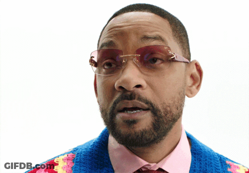 Man In Sunglasses And Colorful Sweater GIF
