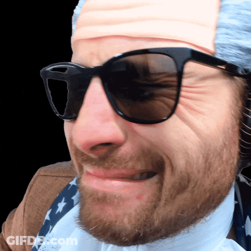 Man In Sunglasses And Fake Wig GIF