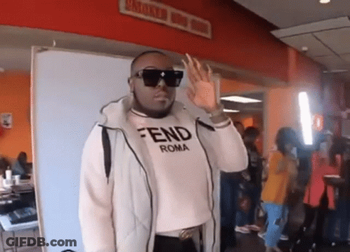 Man In Sunglasses And Fendi Roma Shirt Waving Hand GIF