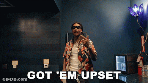 Man In Sunglasses And Floral Shirt Saying Got Em Upset GIF