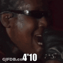 Man In Sunglasses And Gloves Laughing Saying 4 10 GIF