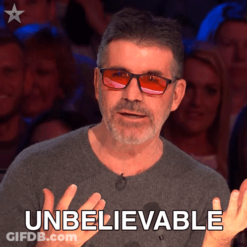 Man In Sunglasses And Gray Shirt Says Unbelievable GIF