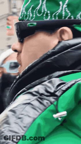 Man In Sunglasses And Green Brooklyn Hat GIF
