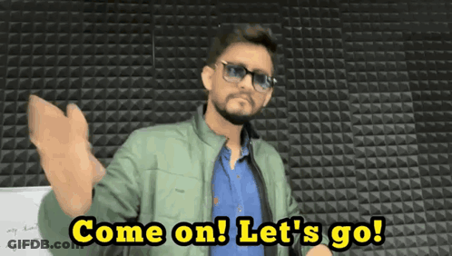 Man In Sunglasses And Green Jacket Saying Come On Let's Go GIF