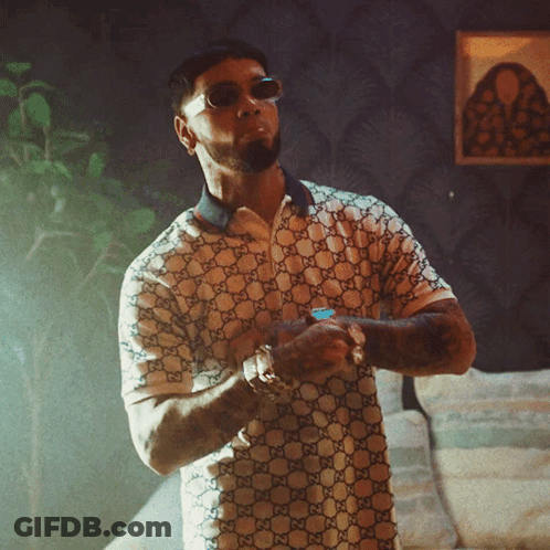 Man In Sunglasses And Gucci Shirt Checking Watch GIF