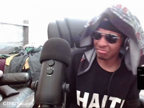 Man In Sunglasses And Haiti Shirt GIF