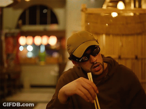 Man In Sunglasses And Hat Holding Chopsticks GIF