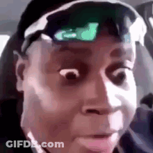 Man In Sunglasses And Hat Making Funny Face GIF