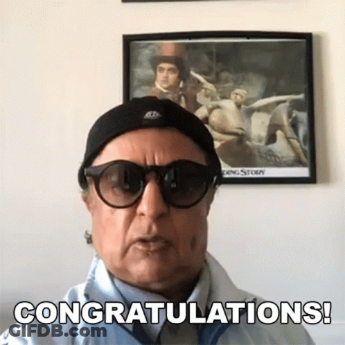 Man In Sunglasses And Hat Says Congratulations GIF
