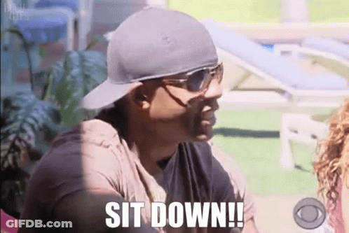 Man In Sunglasses And Hat Says Sit Down GIF