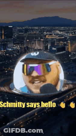 Man In Sunglasses And Hat Schmitty Says Hello GIF