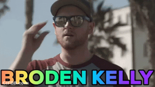 Man In Sunglasses And Hat With Name Broden Kelly GIF