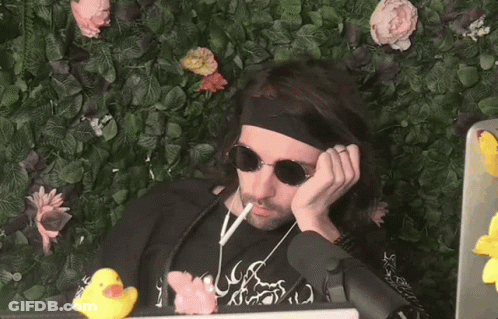 Man In Sunglasses And Headband Smoking Cigarette GIF