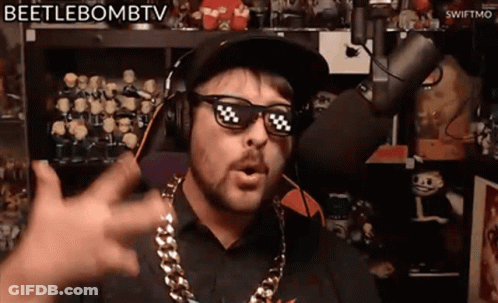 Man In Sunglasses And Headphones Saying Beetlebombtv At Microphone GIF