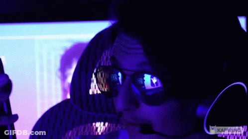 Man In Sunglasses And Headset Looking At Computer With Karwing GIF