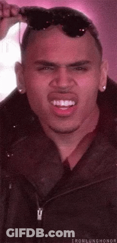 Man In Sunglasses And Jacket Making Funny Face GIF