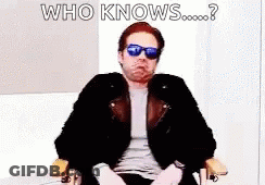 Man In Sunglasses And Jacket Making Funny Face GIF