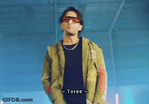 Man In Sunglasses And Jacket Saying Toree GIF