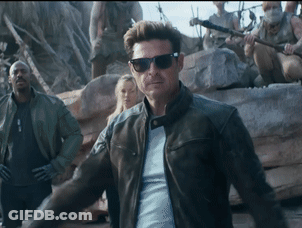 Man In Sunglasses And Leather Jacket Walking GIF