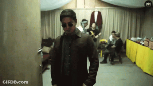 Man In Sunglasses And Leather Jacket With Letter M GIF