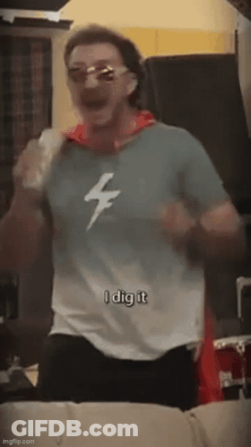 Man In Sunglasses And Lightning Bolt Shirt Dancing GIF