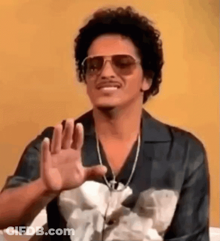 Man In Sunglasses And Necklace Making Stop Sign GIF