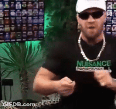 Man In Sunglasses And Nusance Shirt Dancing GIF