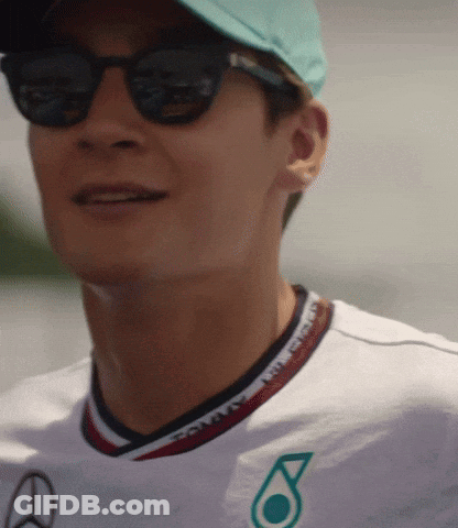 Man In Sunglasses And Petronas Shirt GIF