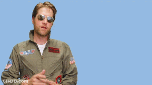 Man In Sunglasses And Pilot Jacket Points To You GIF