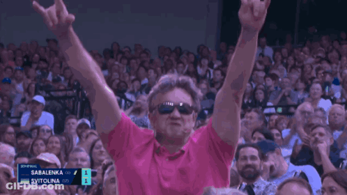 Man In Sunglasses And Pink Shirt Applauding At Tennis GIF