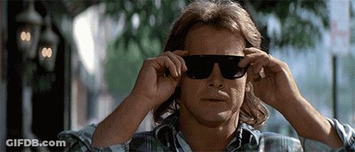 Man In Sunglasses And Plaid Shirt Adjusting Sunglasses GIF