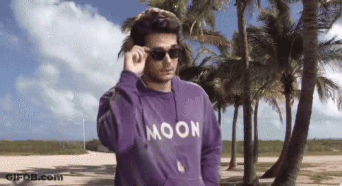 Man In Sunglasses And Purple Moon Shirt GIF