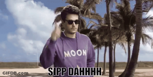 Man In Sunglasses And Purple Moon Sweatshirt Says Sipp Dahhhh GIF