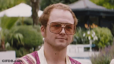 Man In Sunglasses And Purple Robe Smiling GIF