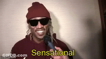 Man In Sunglasses And Red Beanie Saying Sensational GIF