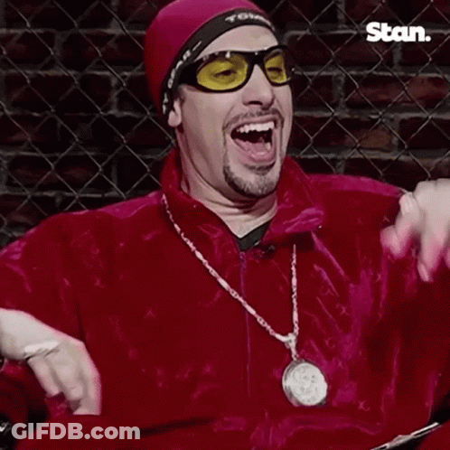 Man In Sunglasses And Red Jacket Saying Wicked GIF