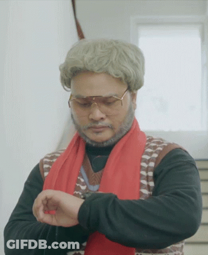 Man In Sunglasses And Red Scarf Checking Watch GIF