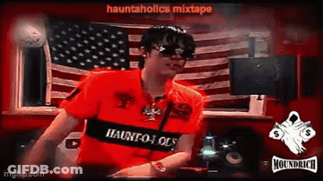 Man In Sunglasses And Red Shirt Saying Hauntholics Mixtape Dancing In Front Of American Flag GIF