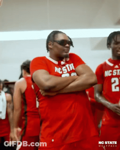 Man In Sunglasses And Red Shirt Saying NC State GIF
