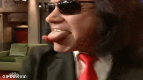 Man In Sunglasses And Red Tie Sticking Out Tongue GIF
