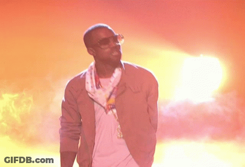Man In Sunglasses And Scarf At Sunset GIF
