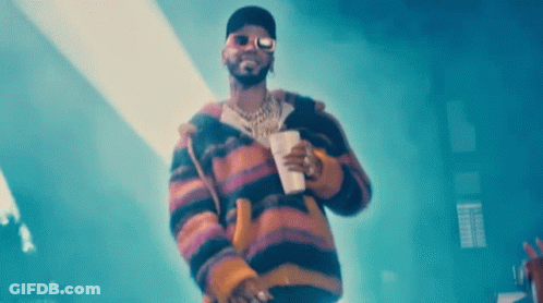 Man In Sunglasses And Striped Jacket Holding Coffee GIF