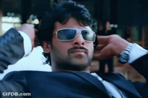 Man In Sunglasses And Suit Hands On Head GIF