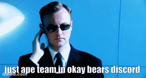Man In Sunglasses And Suit On Phone Saying Just Ape Team In Okay Bears Discord GIF