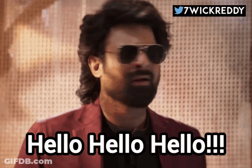 Man In Sunglasses And Suit Saying Hello GIF