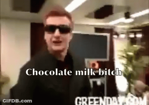 Man In Sunglasses And Suit Says Chocolate Milk Bitch GIF
