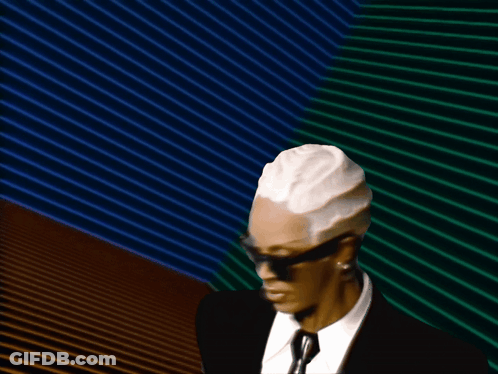 Man In Sunglasses And Suit Smiling GIF