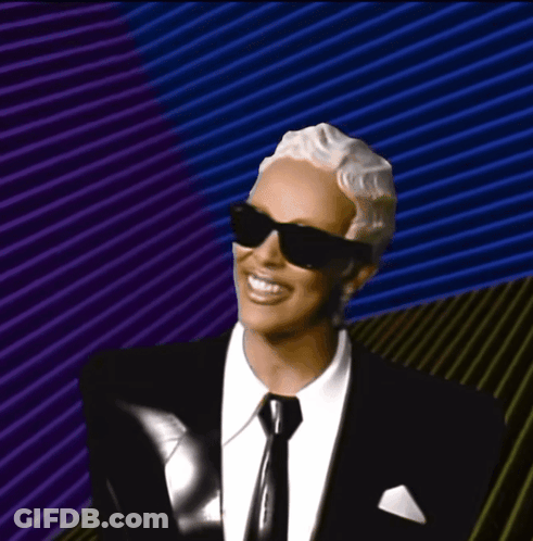 Man In Sunglasses And Suit Smiling GIF