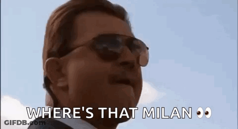 Man In Sunglasses And Suit Talking About Milan GIF