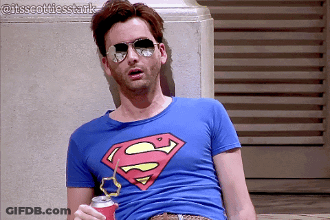 Man In Sunglasses And Superman T-Shirt GIF